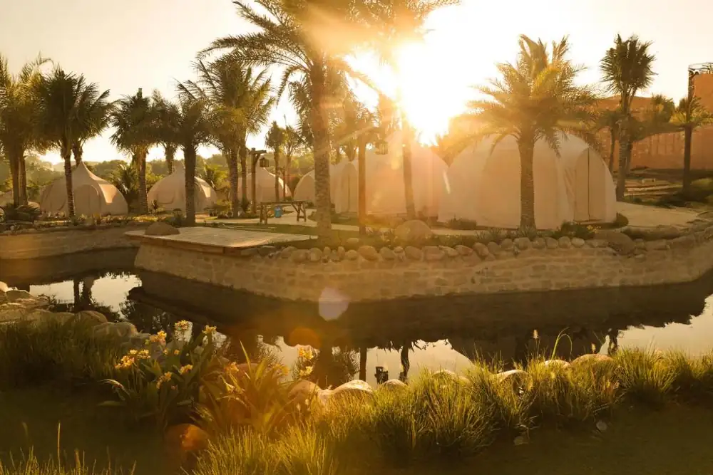 Sunset view of luxury glamping tents at The Silk Road Mui Ne