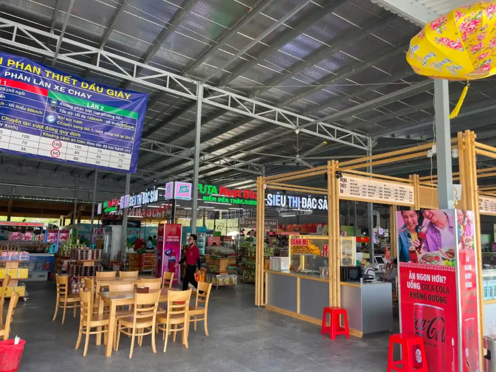 Food court and local specialty market at a highway rest stop on the Ho Chi Minh to Nha Trang route